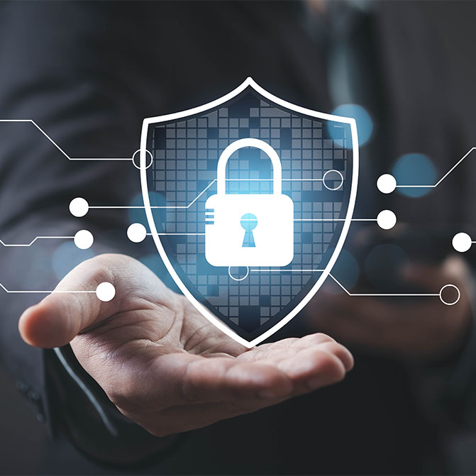 A Digital Security Concept showing a hand holding a shield with a lock symbol representing Cybersecurity and Data Protection